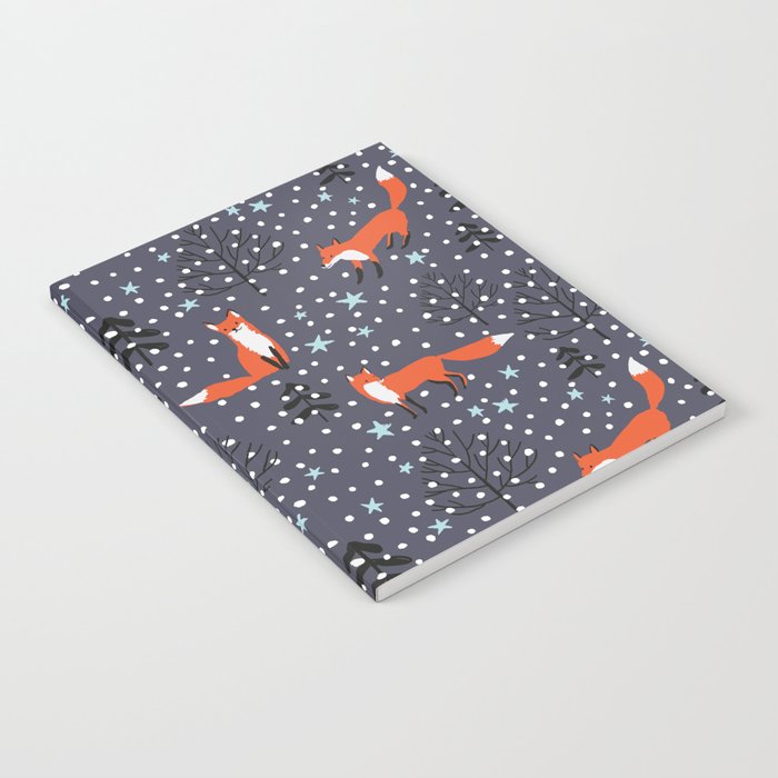 Red foxes in the nignt winter forest Notebook
