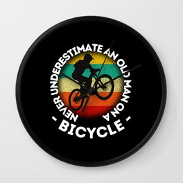 Never Underestimate An Old Man On A Bicycle Wall Clock