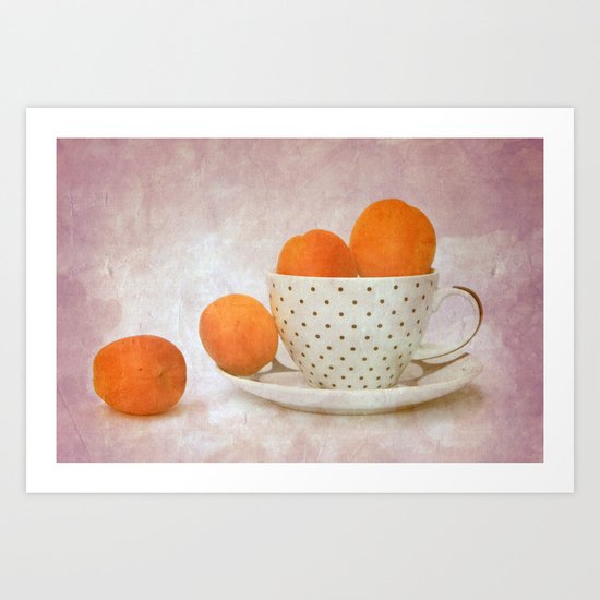 a cup full of apricots Art Print
