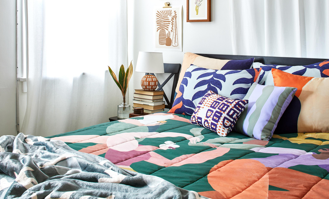 bedroom with green, blue and orange decor