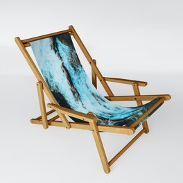 Blue white waves under cliff Sling Chair