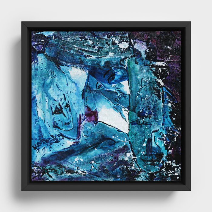 Faces in blue Framed Canvas