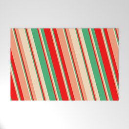 [ Thumbnail: Red, Sea Green, Bisque & Light Salmon Colored Lines/Stripes Pattern Welcome Mat ]