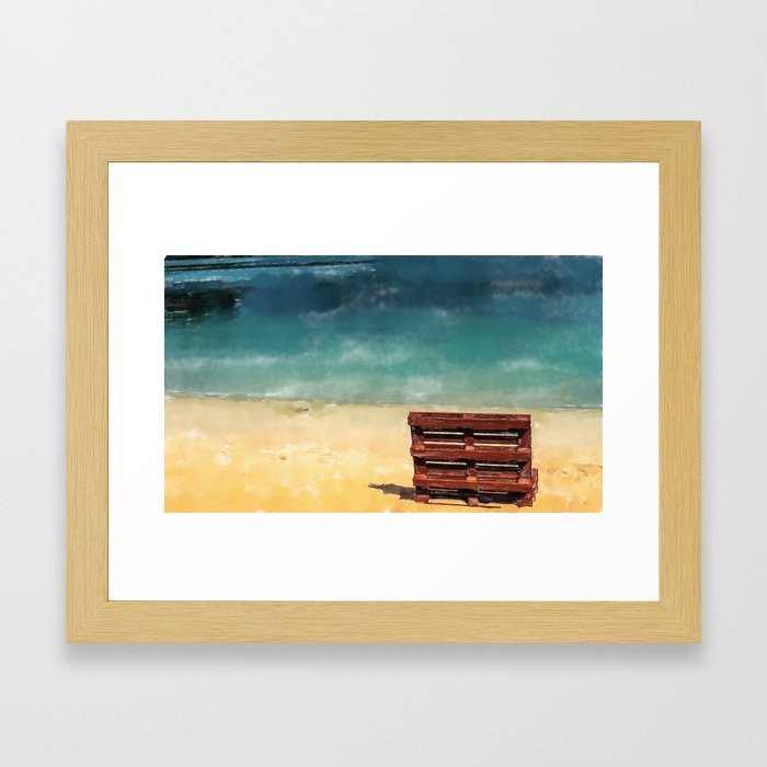 empty beach and a deck chair  Framed Art Print