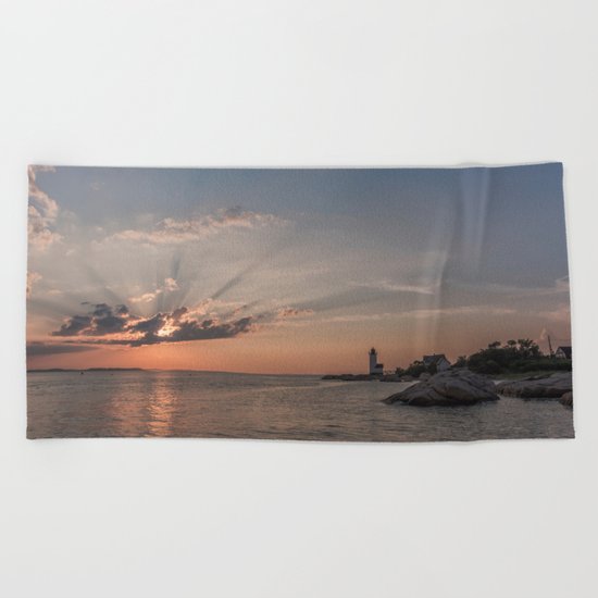 Sunbeams at Annisquam lighthouse Beach Towel