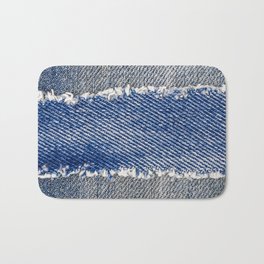 Denim frame. Ripped denim fabric with fringe edge on bleached denim background, text place, copy space. Worn Jeans Casual Double Color patch. Classic blue denim pattern texture  Bath Mat