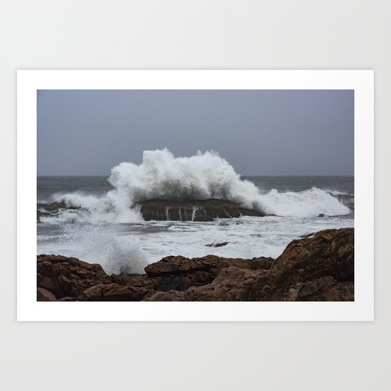 Wave splashing on the rocks Art Print