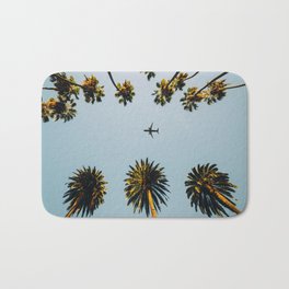 Palms and plane Bath Mat