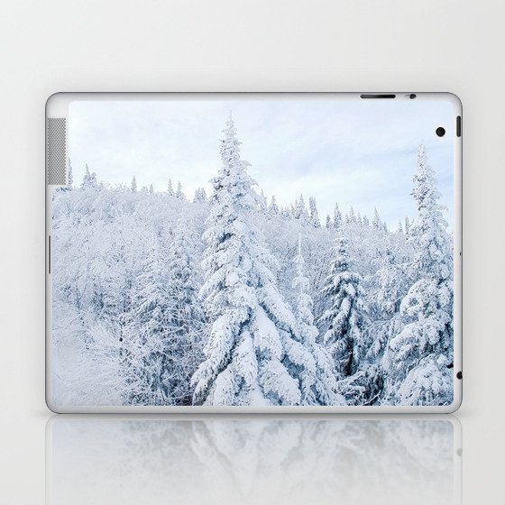 Snow covered forest Laptop & iPad Skin