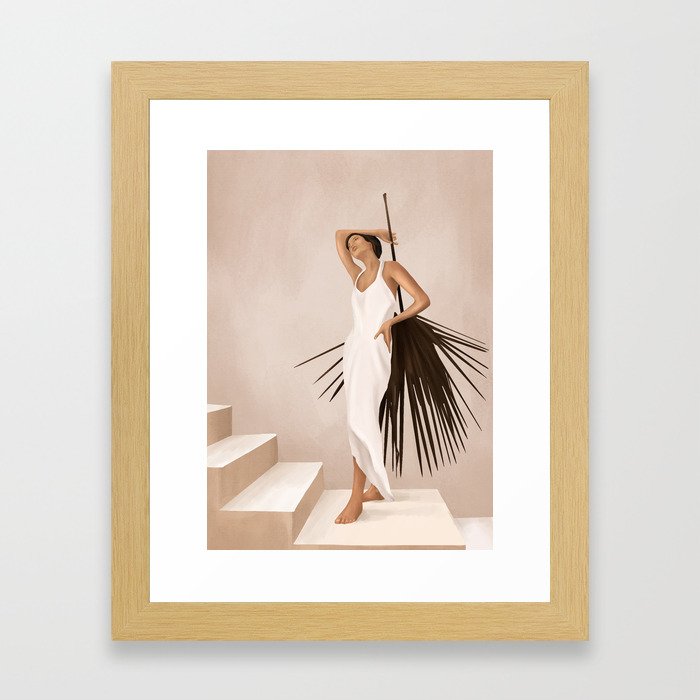 Minimal Woman with a Palm Leaf Framed Art Print