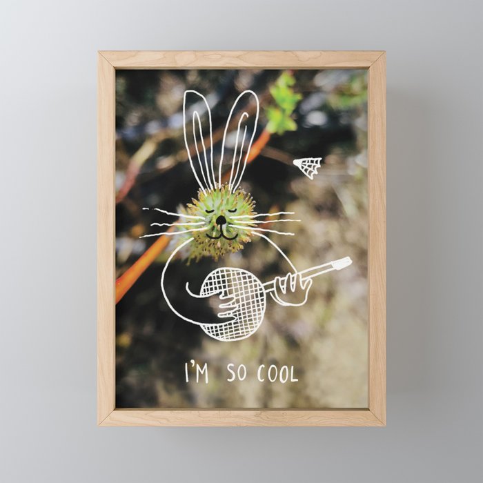 Musician playing with badminton racket Framed Mini Art Print