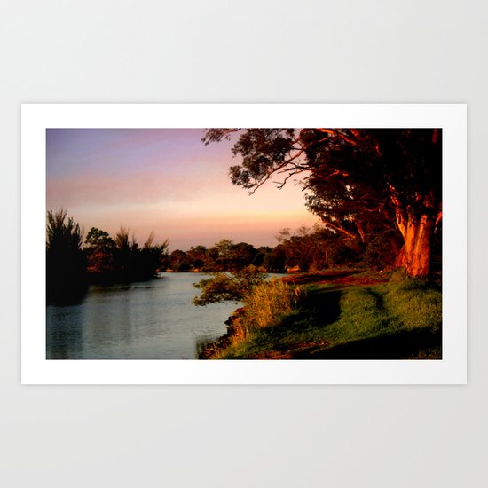 Reflecting sunset on the river Bank Art Print