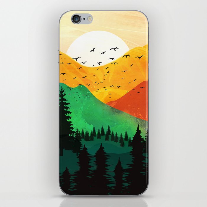 Sunrise over the colorful mountain peaks iPhone Skin