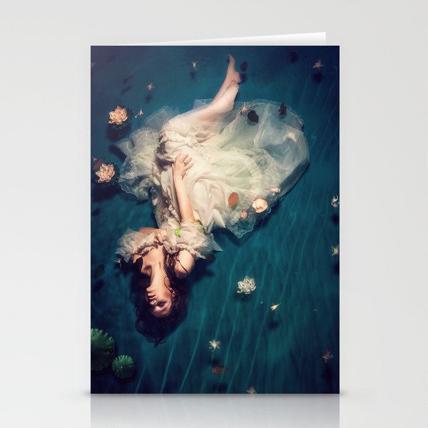 Dreamland and flowers in lily pond; female in white gown floating magical realism fantasy female portrait color photograph / photography Stationery Cards