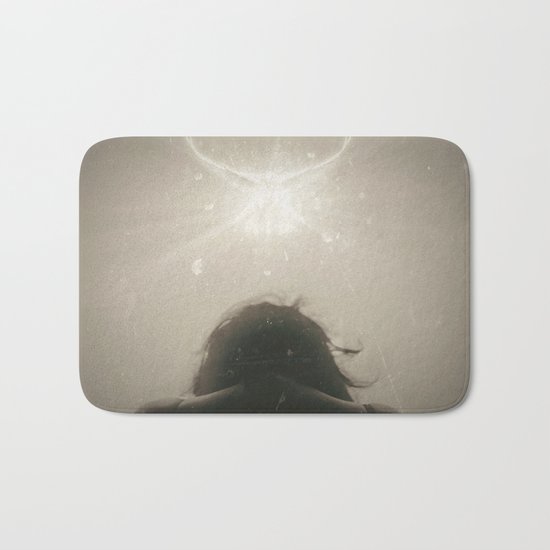 A blinding light Bath Mat