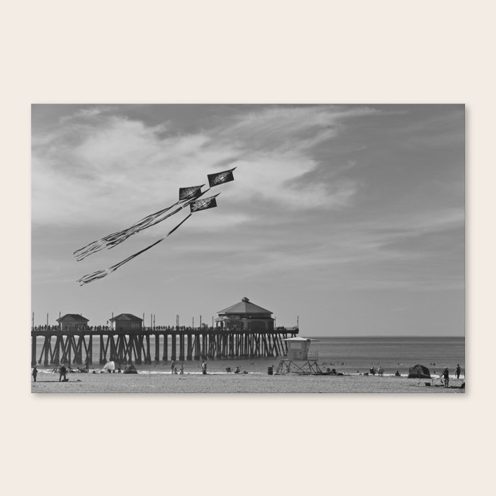 Flying Kites At The Huntington Beach Pier Canvas Print by John Minar