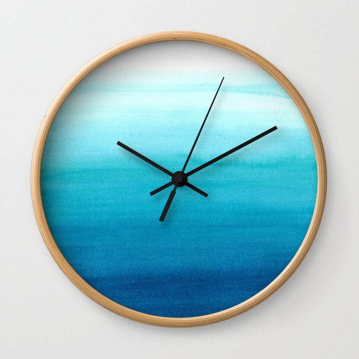 Dive into blue Wall Clock