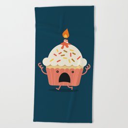 Cupcake on fire Beach Towel