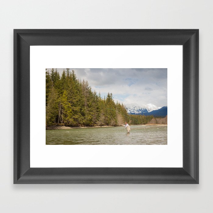 A fly fisherman casting on the Kalum River in the Skeena Region of British Columbia, Canada Framed Art Print