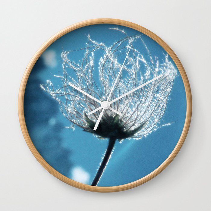 Flower shining in the light snowy mountains #1 Wall Clock
