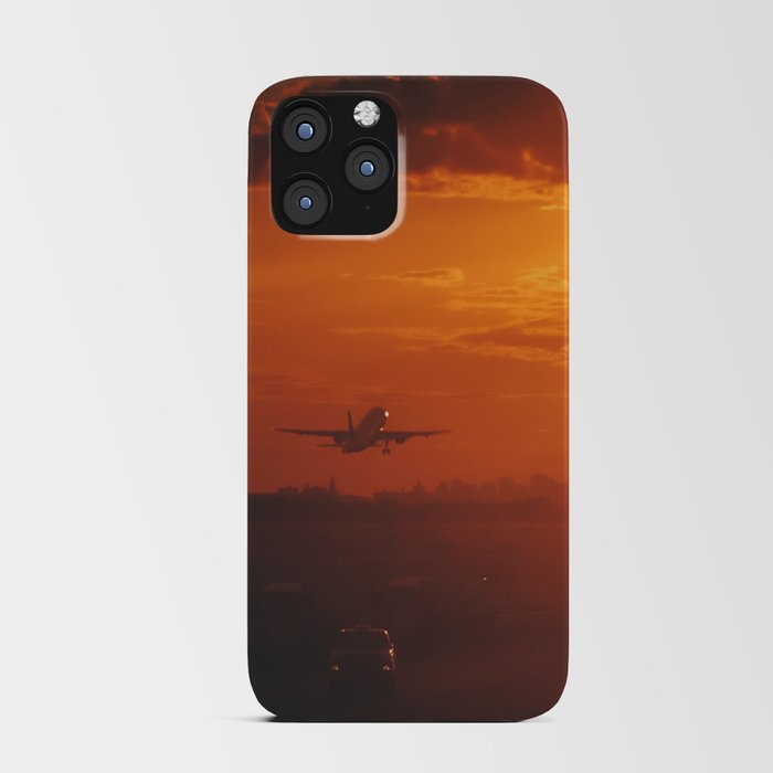 Airplane taking off from New York City airport into the sunset iPhone Card Case