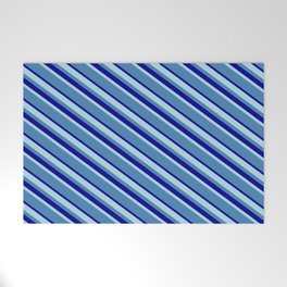 [ Thumbnail: Light Blue, Blue & Dark Blue Colored Lined/Striped Pattern Welcome Mat ]