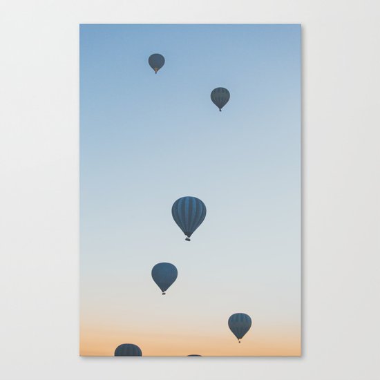 balloons over the desert Canvas Print