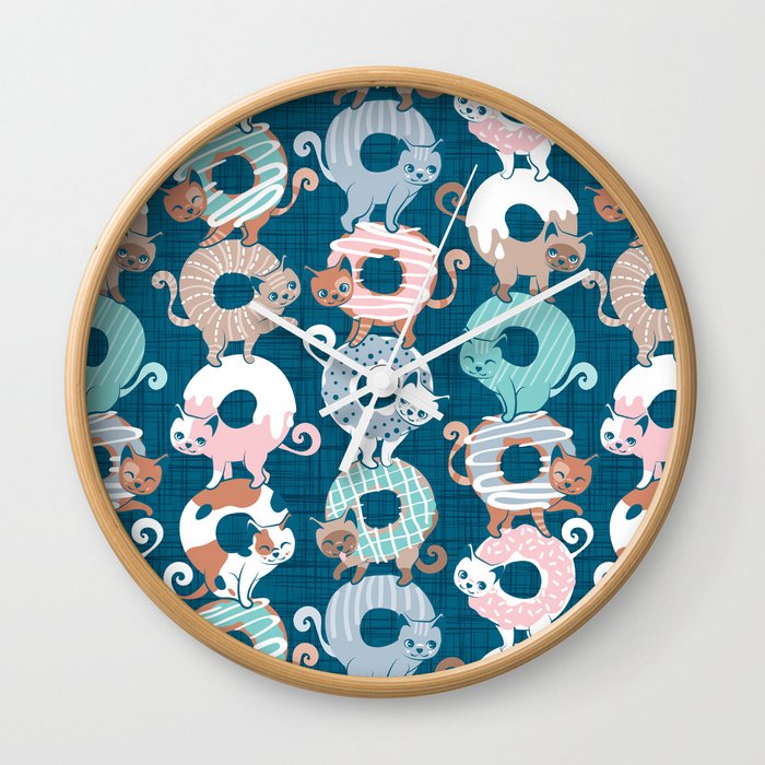 Cats Donut Care // teal background with slight linen texture pastel pink, blue, mint and brown sweet kitties Wall Clock