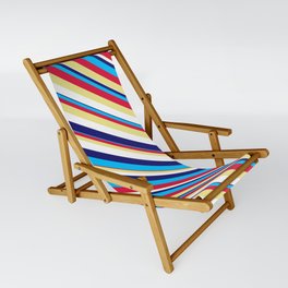 [ Thumbnail: Eyecatching Midnight Blue, Deep Sky Blue, Crimson, Tan, and White Colored Lined Pattern Sling Chair ]