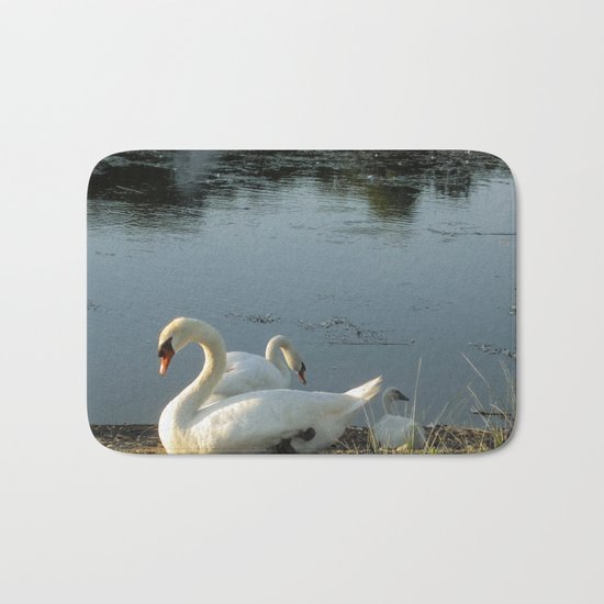 Parents and baby relaxing on the shore Bath Mat