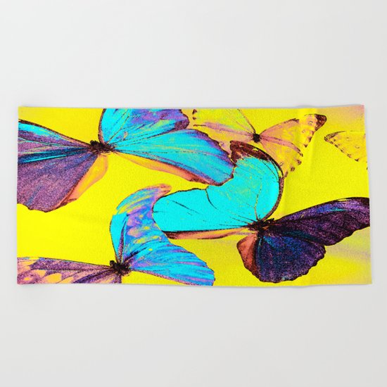 Shiny and colorful butterflies Beach Towel