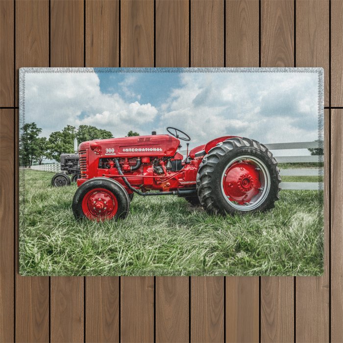 300 Vintage International Harvester Red Tractor Outdoor Rug by Enzwell