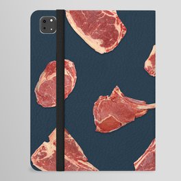Pattern of fresh beef steaks over blue iPad Folio Case
