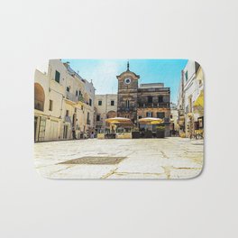Little square in the medieval center of the white village of Cisternino Bath Mat | Cisternino, Architecture, Town, Italy, White, Europe, Itria, Scenic, Apulia, Medieval 