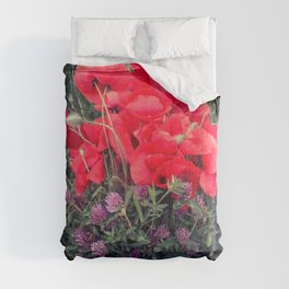 Summer red poppies and clover bloquet in woman's hand field essence Comforter
