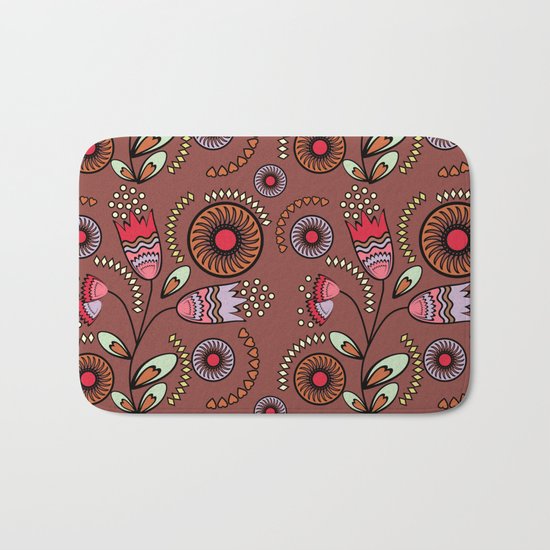 Bright stylized flowers on a brown background. Bath Mat