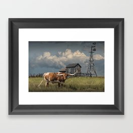 Longhorn Steer in a Prairie pasture by 1880 Town with Windmill and Old Gray Wooden Barn Framed Art Print