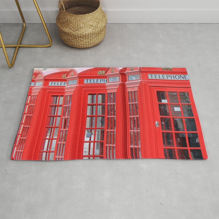 Great Britain Photography - Phone Booths Lined Up Beside Each Other Rug