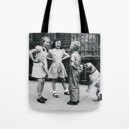 Boys ain't the brightest bulbs in the pack; unsuspecting boy flirting with girls gets his ice cream eaten by smart canine dog funny humorous black and white vintage photograph - photography - photographs Tote Bag