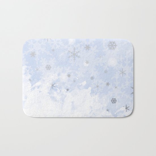 Silver snowflakes on blue Bath Mat