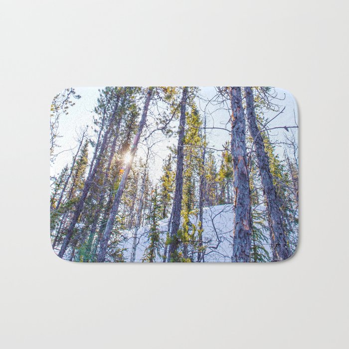 Sunset in the forest Bath Mat