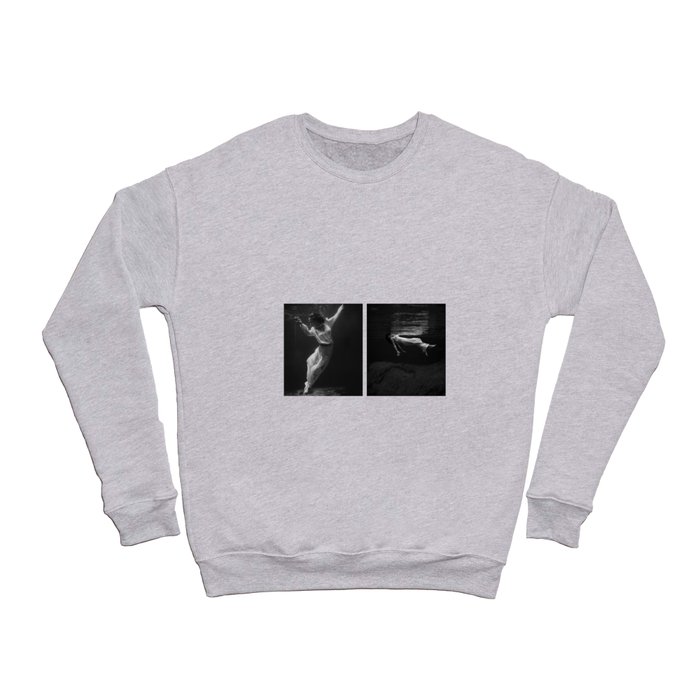 Underwater view of a women, wearing a long gown, floating in water collage fashion and glamour photography / photographs by Toni Frissell Crewneck Sweatshirt