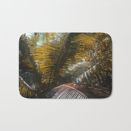 Into the Seychellian leaves Bath Mat