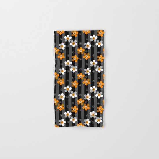 Black and yellow floral pattern on a striped background . Hand & Bath Towel