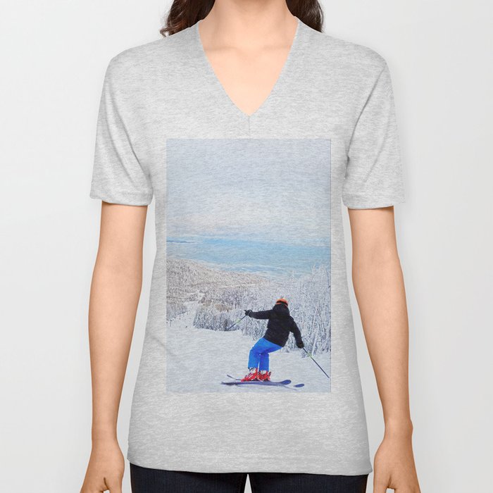 Skier at a ski resort with snowy mountain and lake V Neck T Shirt