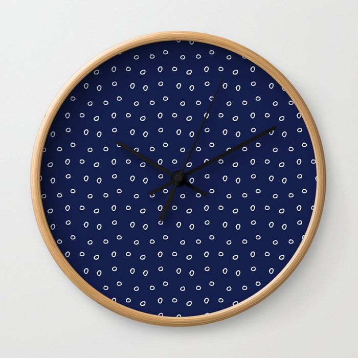 Navy blue background with white minimal hand drawn ring pattern Wall Clock