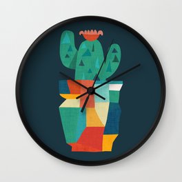 Blooming cactus in cracked pot Wall Clock