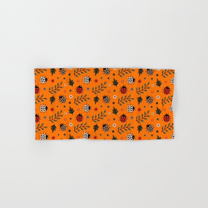 Ladybug and Floral Seamless Pattern on Orange Background Hand & Bath Towel