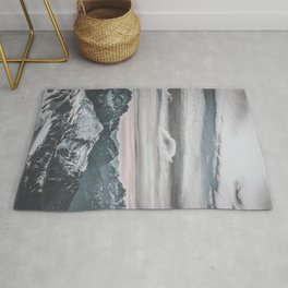 cloudy days with snowy mountains Rug