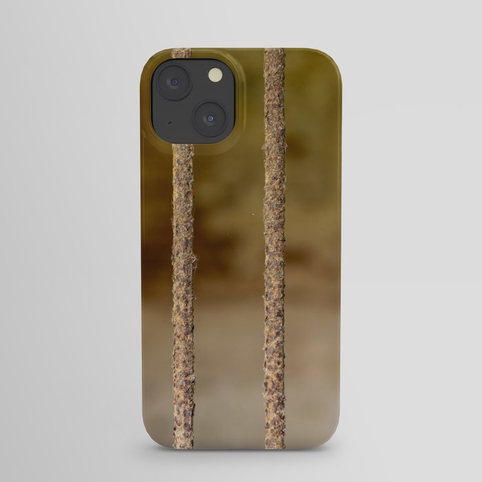 Close-up of rusty prison cell bars with shallow focus iPhone Case